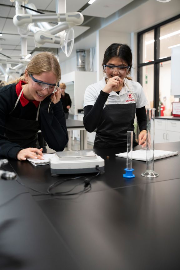 Two private school girls in science superlab