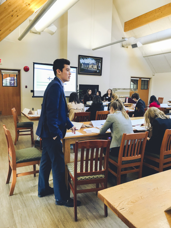 A student speaking at a debate competition